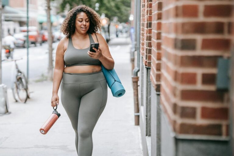 Plus size woman wearing high-waist leggings for everyday comfort